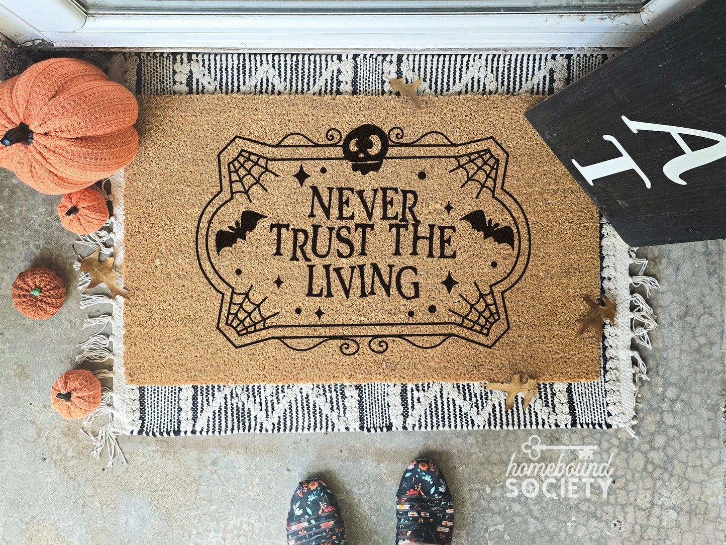 Never Trust the Living Halloween Doormat