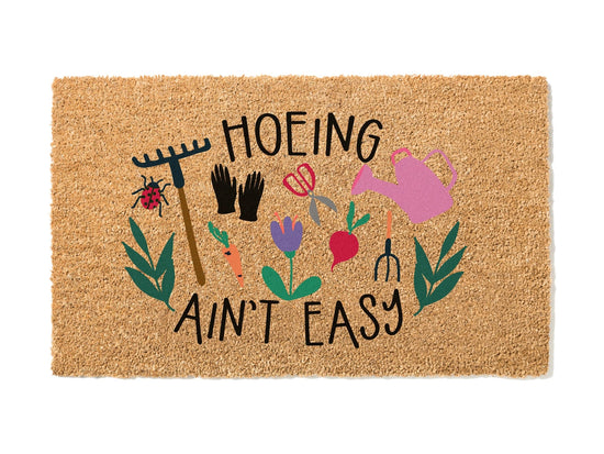 Hoeing Ain't Easy Spring Doormat
